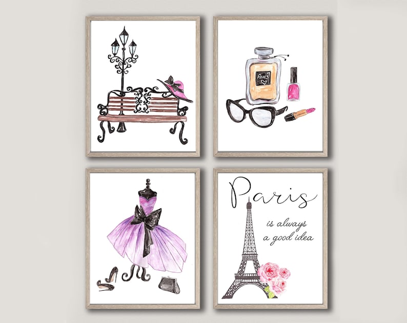 May include: Set of four watercolor prints with a Parisian theme. The prints feature a bench with a hat, a perfume bottle with nail polish and lipstick, a dress with shoes and a purse, and the Eiffel Tower with flowers and the text "Paris is always a good idea".