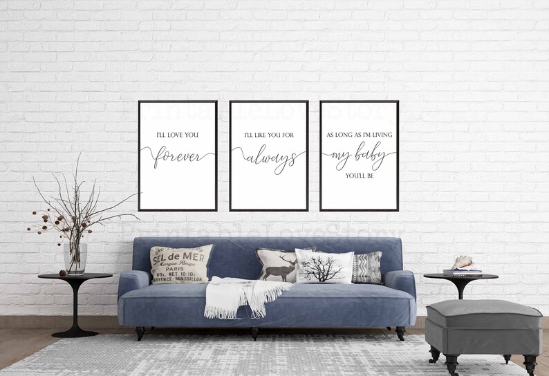 May include: Three black framed prints with white backgrounds and black calligraphy text. The text reads "I'll love you forever", "I'll like you for always", and "As long as I'm living my baby you'll be".