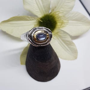 Mystical ring with Ceylon moonstone, silver 925 with gold decoration yellow gold 750,