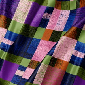 May include: A fabric featuring a multi-colored plaid pattern with rectangular blocks of light green, dark blue, bright pink, purple, and burnt orange. The surface has a visible textured, brushstroke-like finish across the woven material.
