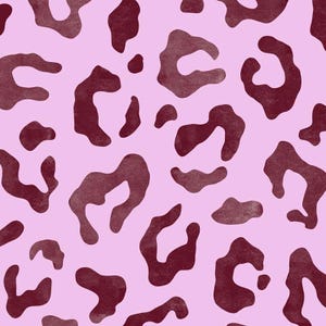 Peut inclure: Un motif sans couture avec un fond rose et des taches de léopard bordeaux.