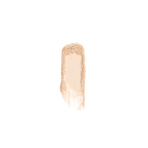 May include: A close-up of a light beige powder makeup swatch on a white background.