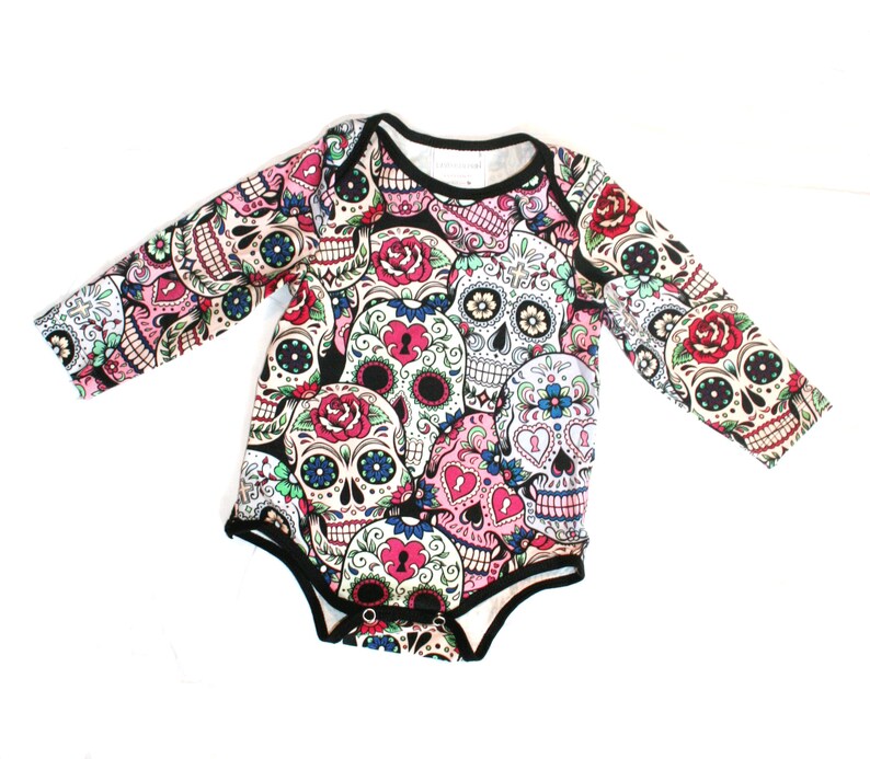 skull baby grow