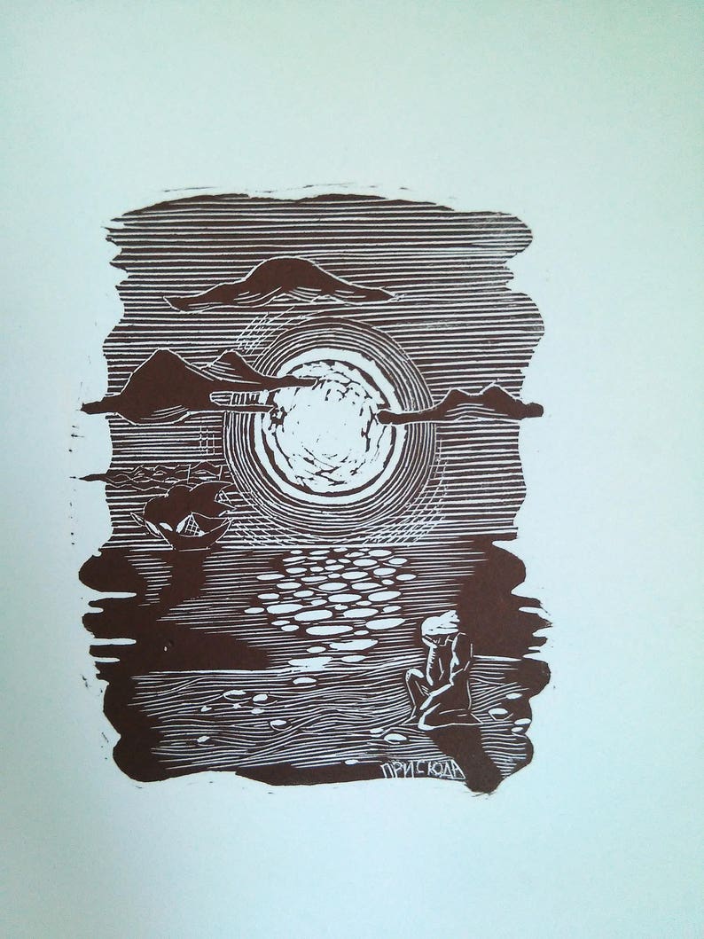 May include: A brown and white linocut print depicting a serene seascape. The artwork features a large sun, clouds, and a figure seated on the shore, with the artist's signature at the bottom. The scene is rendered with detailed lines.