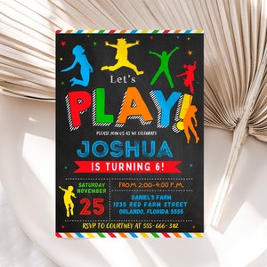May include: A colorful invitation for a child's birthday party. The invitation features a chalkboard background with the words "Let's Play!" in large, colorful letters. The text "Joshua is turning 6!" is also included, along with the date, time, and location of the party.