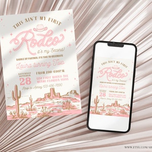 May include: A pink and gold invitation for a second birthday party with a western rodeo theme. The invitation features a pink and gold illustration of a cowboy hat and the text "This ain't my first Rodeo! It's my second!"  The invitation also includes the text "Laura turning two" and details for the party, including the date, time, and location.