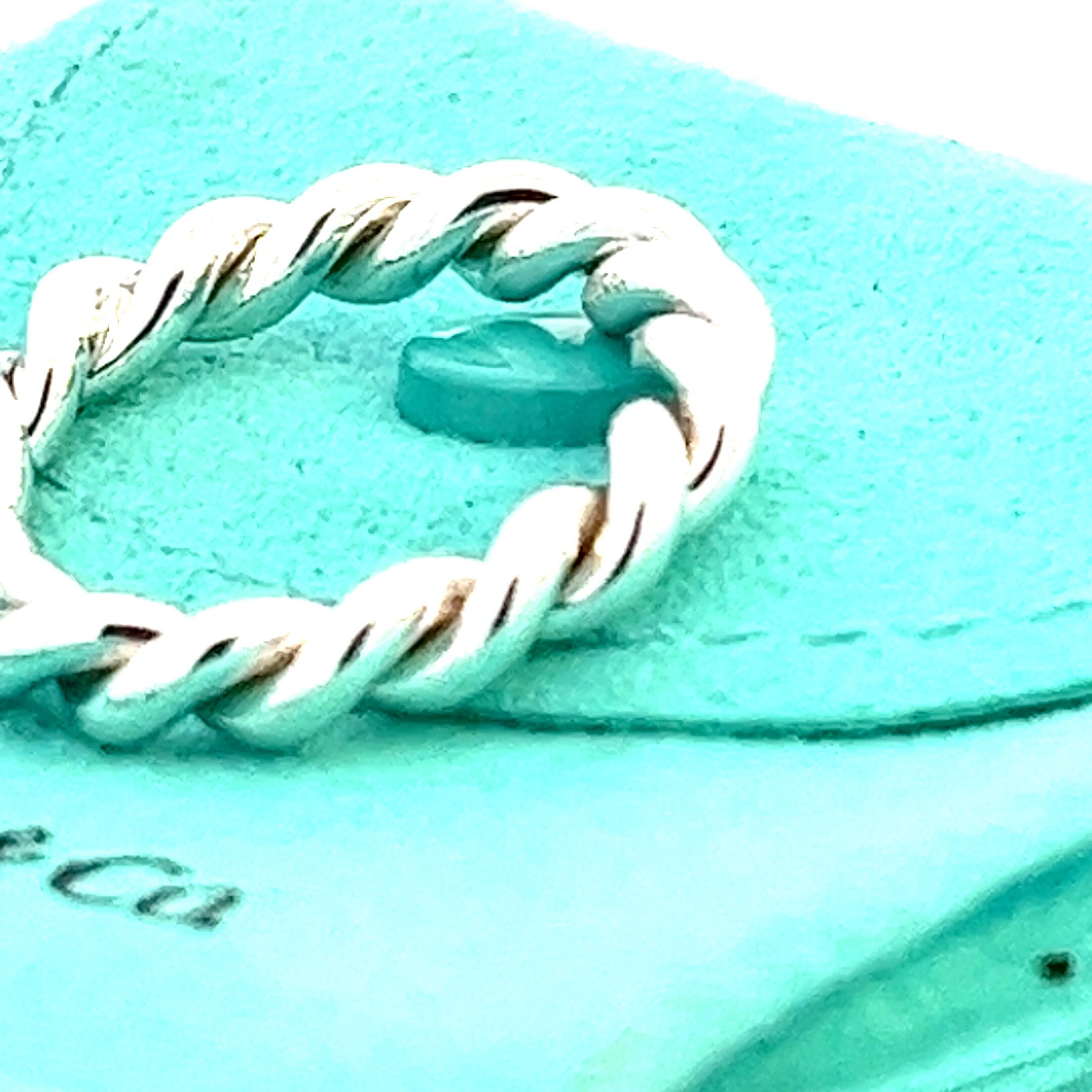 Previously Loved Tiffany and Co. Twist Ring. Ring Size 7.5