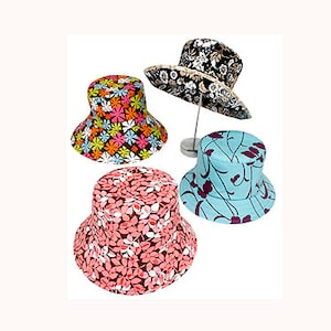 May include: Four bucket hats with different floral patterns. The hats are displayed on a white background.