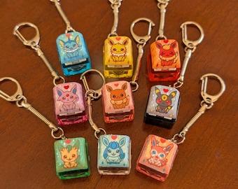 Cute Creature Keycap Clickers - fidget keychain, keyboard caps Eeveelutions fire, water, electric, normal, psychic, dark, grass, ice, fairy