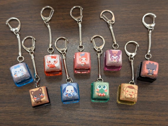 かわいいサンリオキーキャップクリッカー - フィジェットキーチェーン