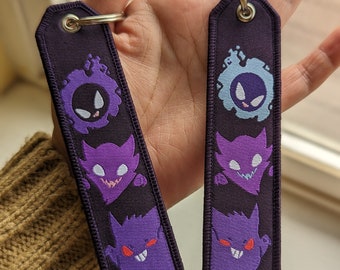 Ghosties Embroidered woven Tag Keychain - Jet tag Keyring Black and Purple w/ Shiny