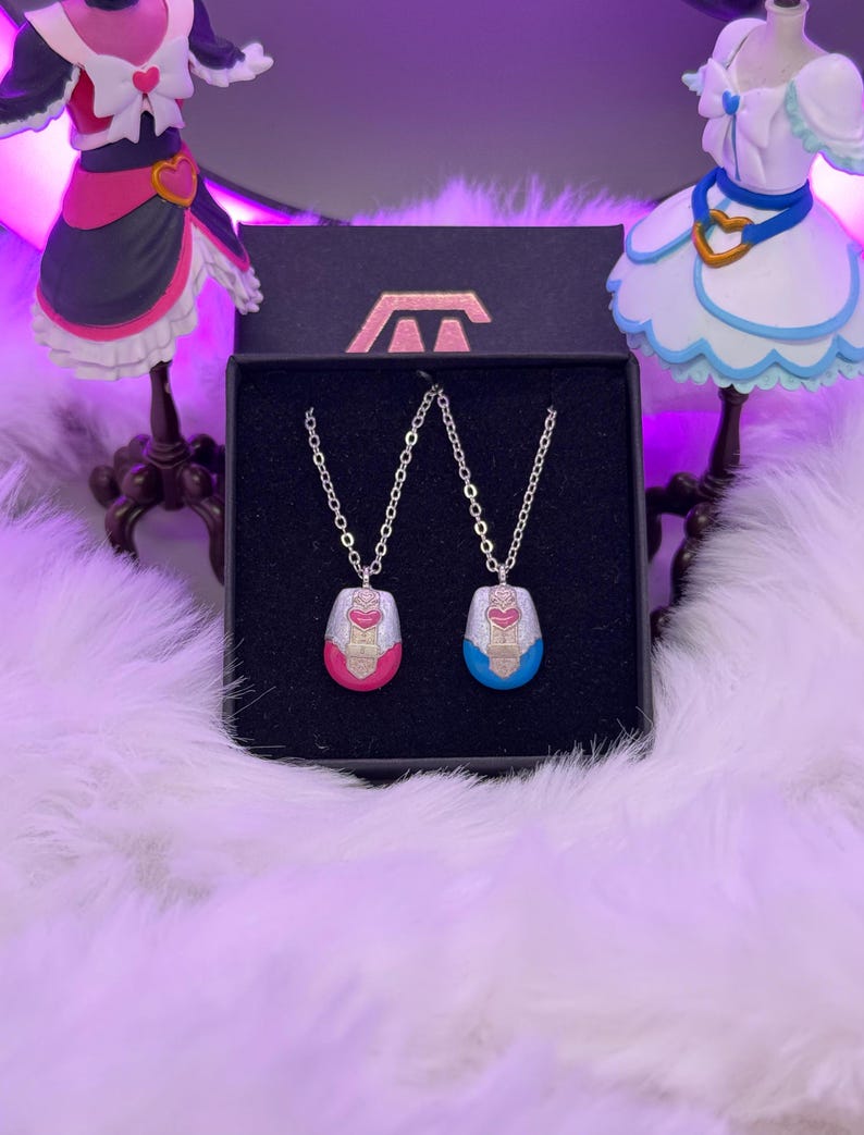 pretty cure magical phone pendant necklace made in metal with pink and blue details