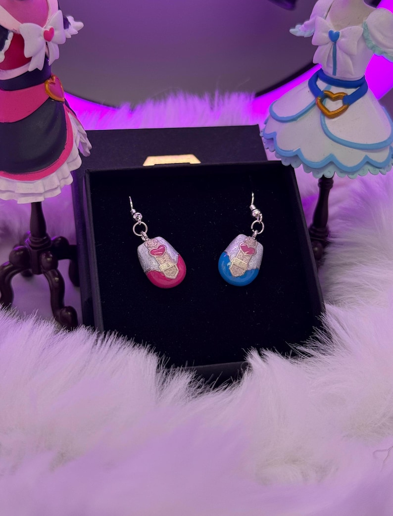 pretty cure magical phone pendant earrings made in metal with pink and blue details
