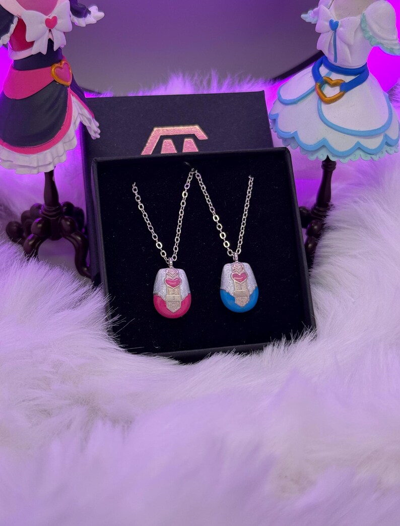pretty cure magical phone pendant necklace made in metal with pink and blue details