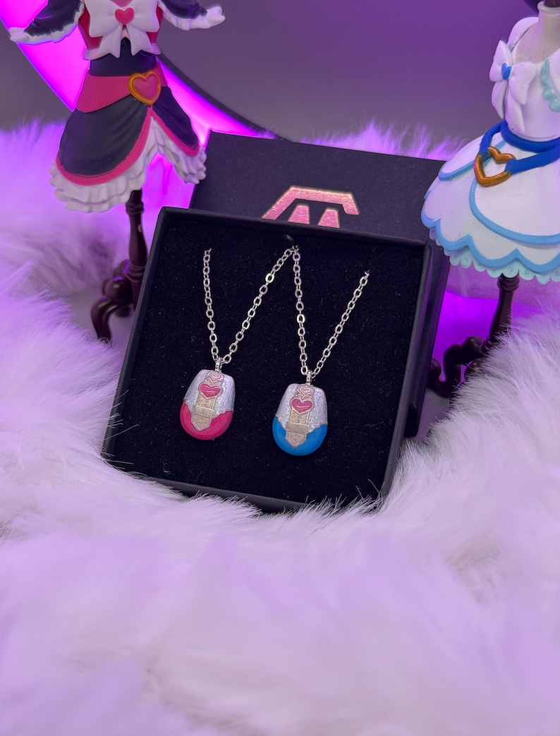 pretty cure magical phone pendant necklaces made in metal with pink and blue details