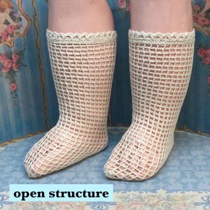 May include: A pair of white crocheted stockings with an open structure. The stockings have a delicate lace trim at the top.