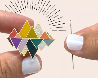 The Mountains - Magnetic Needle Minder