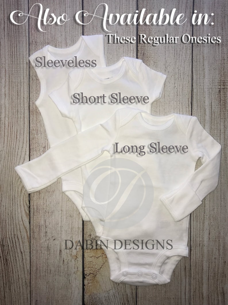 May include: Three white onesies, one sleeveless, one short sleeve, and one long sleeve. The onesies are stacked on top of each other. The text "Also Available in: These Regular Onesies" is at the top of the image. The text "Sleeveless", "Short Sleeve", and "Long Sleeve" are written on the onesies. The text "Dabin Designs" is at the bottom of the image.
