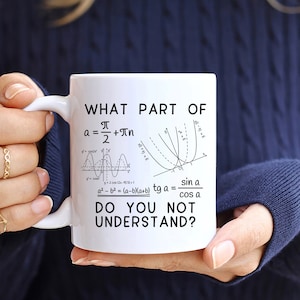 May include: White ceramic mug with a black graphic that says "WHAT PART OF" followed by mathematical equations and the phrase "DO YOU NOT UNDERSTAND?"