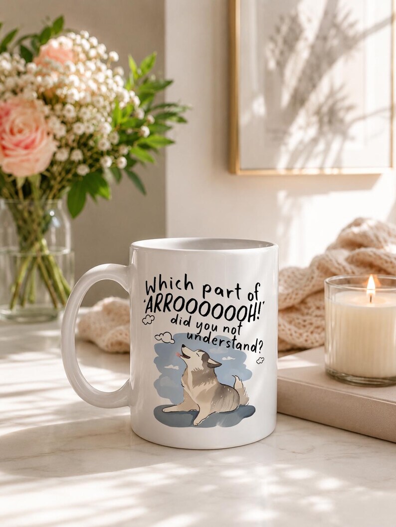 May include: A white ceramic mug featuring a graphic of a howling husky dog and the black text: Which part of ARROOOOOOH! did you not understand? The mug has a curved handle and a smooth finish, displaying a clear illustration of the dog.