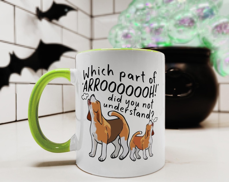 a ceramic mug featuring the phrase 'which part of 'arrooooo!' did you not understand? surrounding an illustration of two beagles howling.