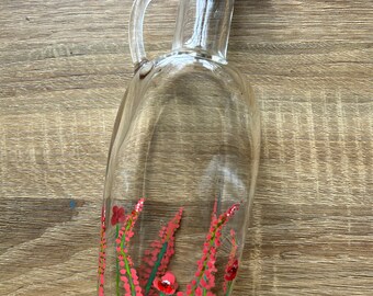 Diseño floral rojo pintado a mano, jarra de aceite.