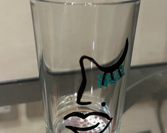 Hand painted abstract line face tumbler glass