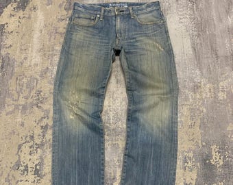 Jean Edwin 506 vintage : denim japonais, bleu délavé, délavage à la boue L32 x 31