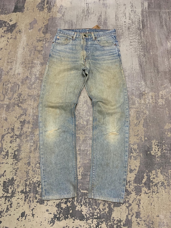 Vintage Levis 606 Rusty Jeans: Stone Wash Denim, Distressed Style