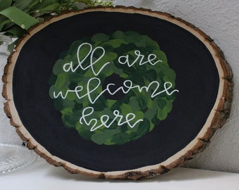 Todos son bienvenidos aquí, cartel