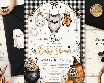 May include: A rectangular baby shower invitation card featuring a black and white buffalo check border, a clothesline with a baby onesie, bib, and socks, a black cauldron, pumpkins, and ghosts. The text reads A LITTLE BOO IS ALMOST DUE!