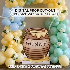 May include: A digital prop cut-out featuring a honey pot with the word "HUNNY" and a balloon arch in pastel colors. The arch is made of yellow, blue, and green balloons, with white floral accents. The text on the image reads "DIGITAL PROP CUT-OUT JPG SIZE 24X36 UP TO 4FT".