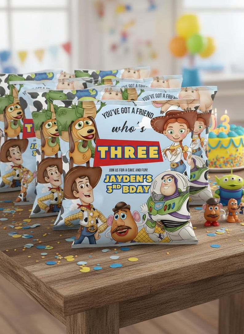 May include: Several light blue party favor bags featuring Toy Story characters, with the text "YOU'VE GOT A FRIEND who's THREE JAYDEN'S 3RD BDAY". The bags are on a wooden table with confetti and a birthday cake.