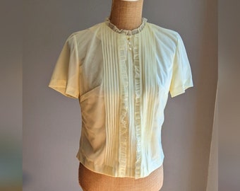 1960's lemon yellow nylon blouse