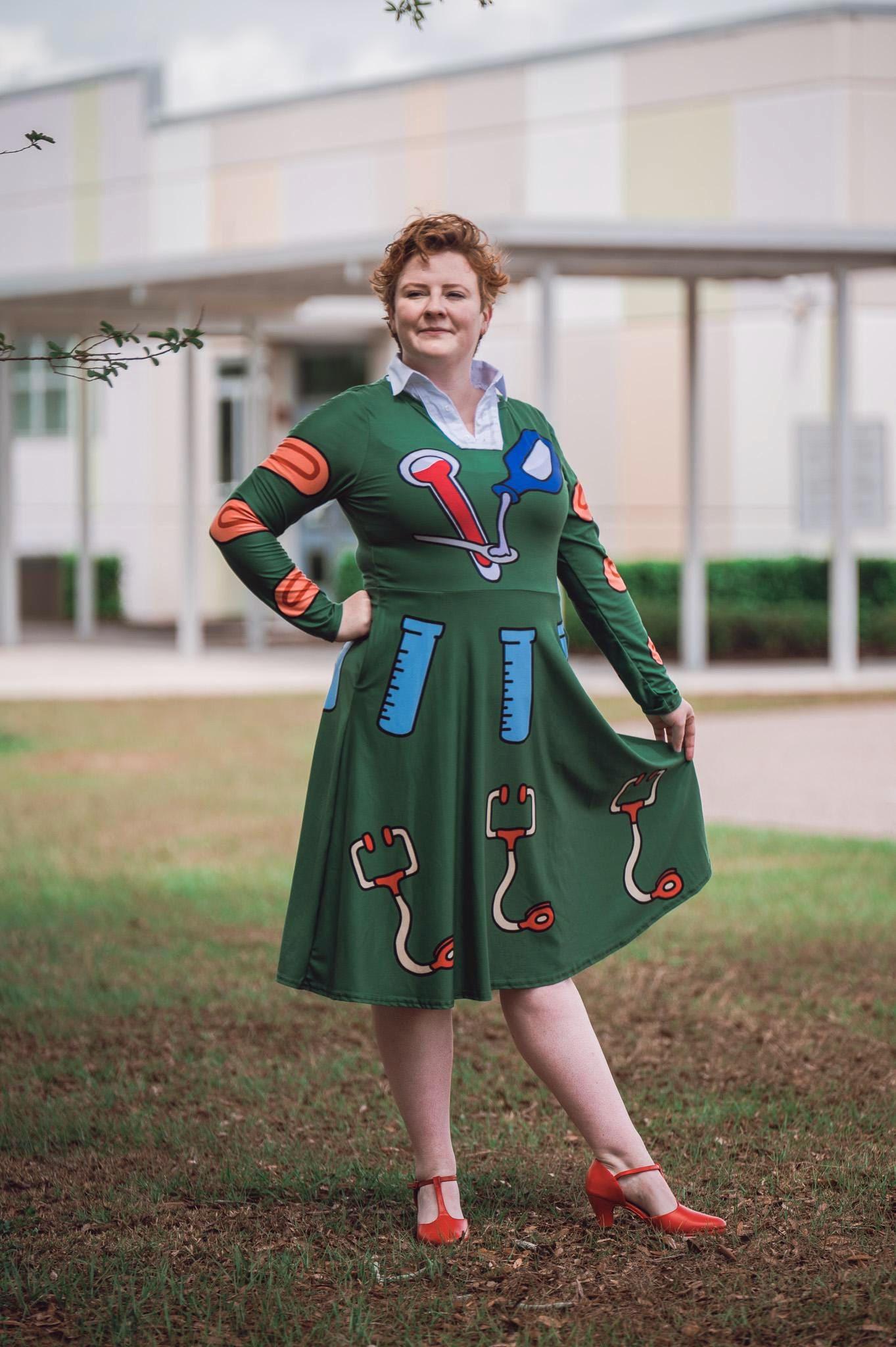 white christmas dresses The Magic School Bus Ms. Frizzle Toss on Blue | Cotton Fabric by the Yard main image 0