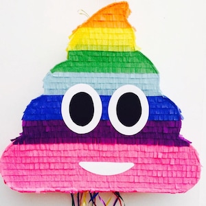 May include: A rainbow-coloured pinata shaped like a pile of poo with googly eyes and a smiling mouth.