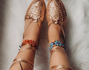 black and gold huaraches womens