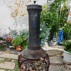 vintage CAST IRON Garden fire pit/backyard fire pit/outdoor fire pit( local pick up only)