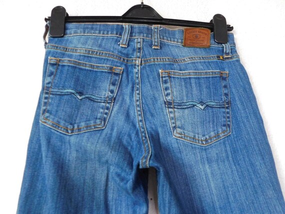 Distressed Jean/stone Wash 