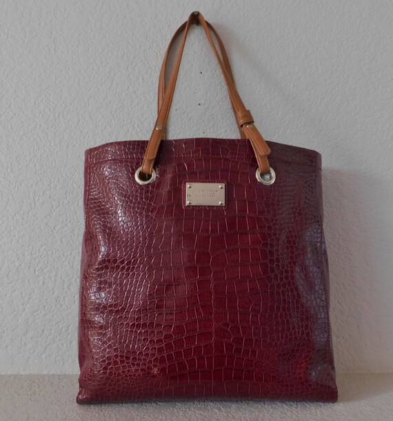 nine west burgundy luggage