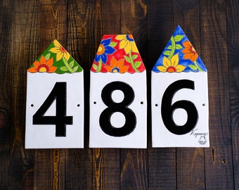 House numbers signs, houses with flower roofs, ceramic number tiles