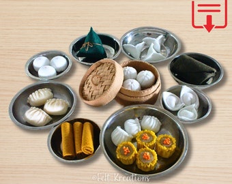 May include: A set of felt food items, including dumplings, buns, and spring rolls, arranged on silver plates. The food is arranged in a circle on a wooden surface. The image includes the text "@Felt_Kreations".