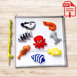 May include: A set of felt sea creatures, including a pufferfish, shrimp, octopus, fish, and a starfish. The felt creatures are colorful and have different patterns.