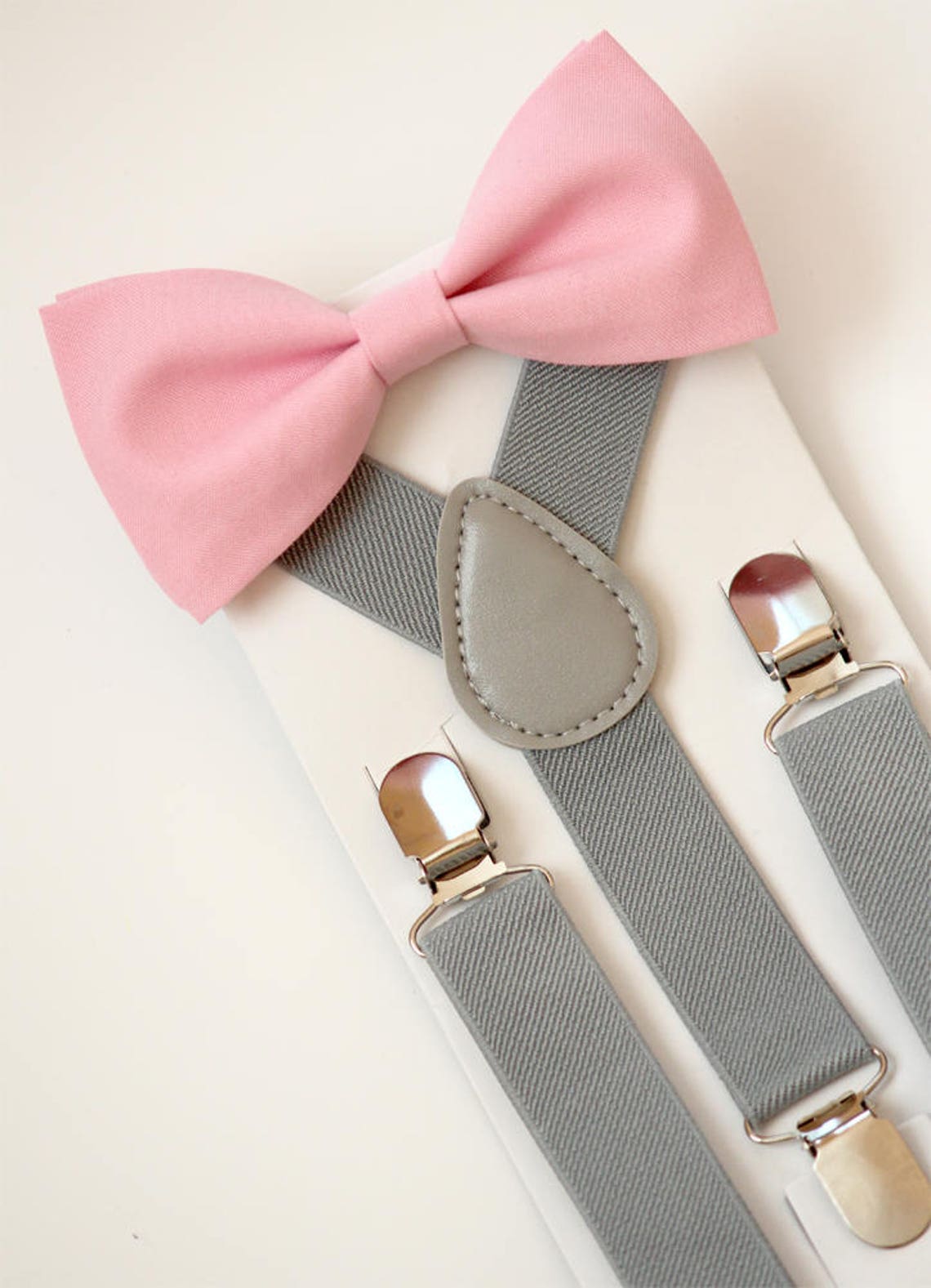 pale pink bow tie and suspenders