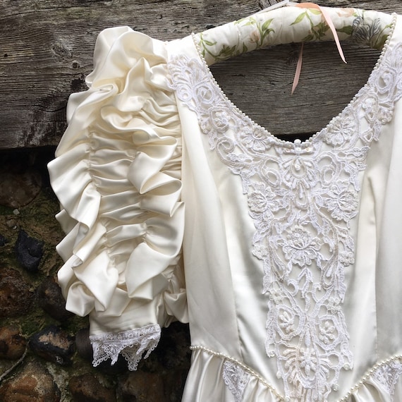 Vintage 80s puff sleeve wedding dress.