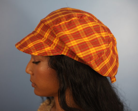 orange newsboy cap