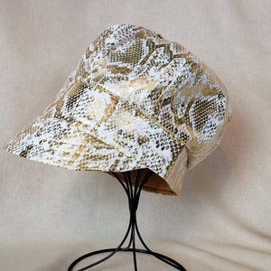 Women's Metallic Gold Snakeskin Print Newsboy Cap