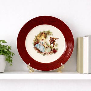 Talerz ceramiczny z Sebring Vintage: Scena zalotów z serenadą, wykończenie z 22-karatowego złota, USA