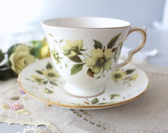 Tasse à thé et soucoupe Royal Vale en porcelaine tendre, bordure florale jaune en or
