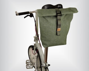 Roll top seat bag bag for Brompton enthusiasts. Water resistant, sturdy and minimalistic.